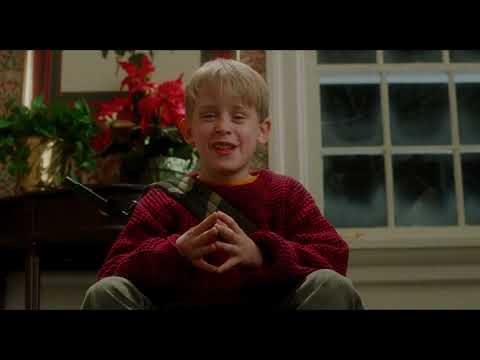 Home Alone trailer frame: nighttime exterior of the McCallister house glowing, hinting at choral holiday sound