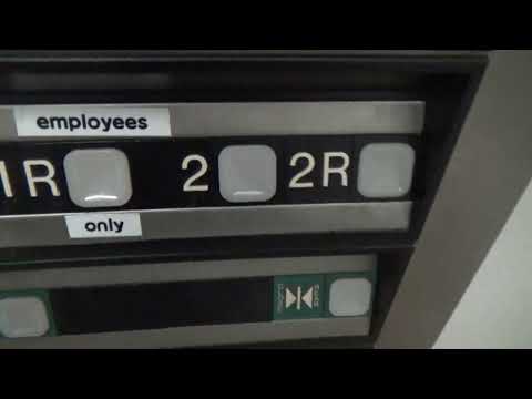 Dover Impulse Hydraulic Elevator With Rear Door at Half of Half Name Brand Clothing, Manchester, MO