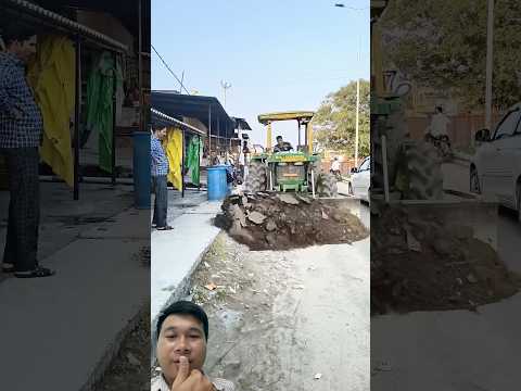 The tractor used a bulldozer to level the ground in the road surface very effectively.#shorts #new
