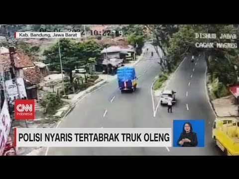 Detik-detik Polisi Nyaris Tertabrak Truk Oleng