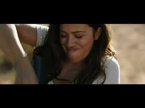 Miss Bala trailer mid-action frame timed to a drum hit