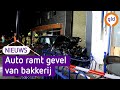 Auto ramt gevel van bakkerij