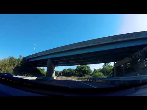 OH Interstate 77 north exit 81 inbound high mast streetlights, mountains, and windmill
