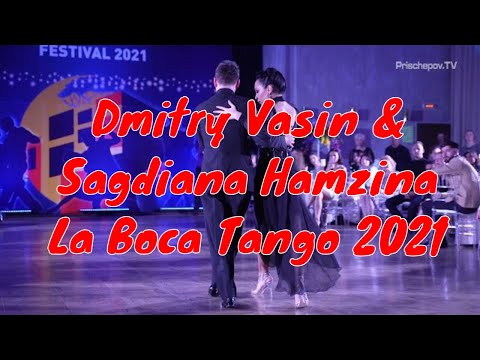  Dmitry Vasin  and  Sagdiana Hamzina  are  dancing  to  the  vals  "  Violetas  "  by  Alberto Castillo  at  La Boca Tango Festival  in  2021