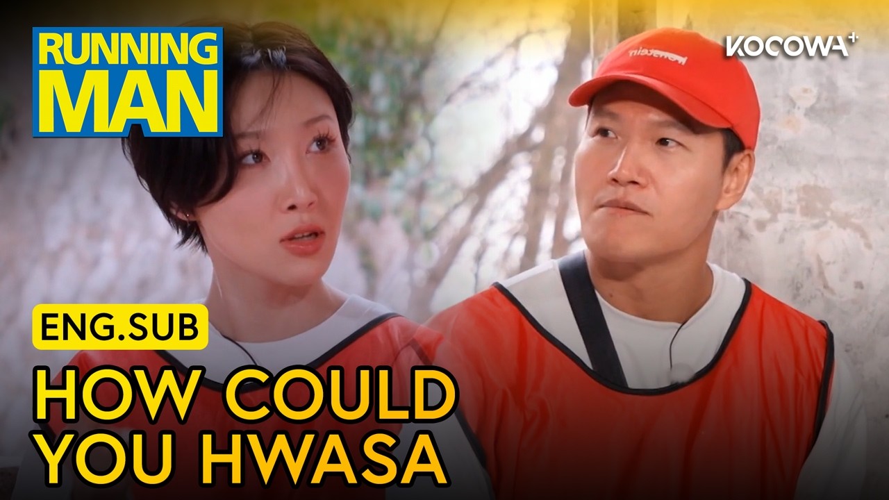 Running Man cast members including Yoo Jae-suk and Kim Jong-kook chasing each other in a Korean variety show challenge with bright yellow name tags visible