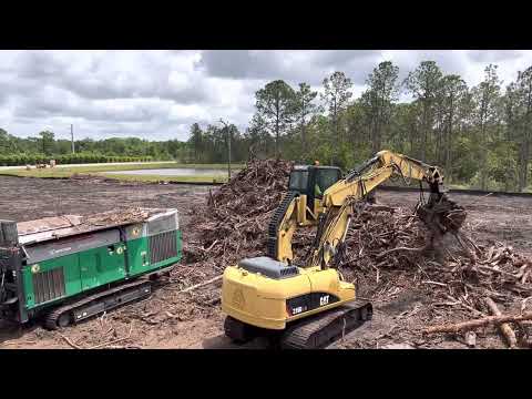 Cat Material Handler Feeding the Crambo