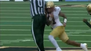 Quarterback gets trucked by the ref