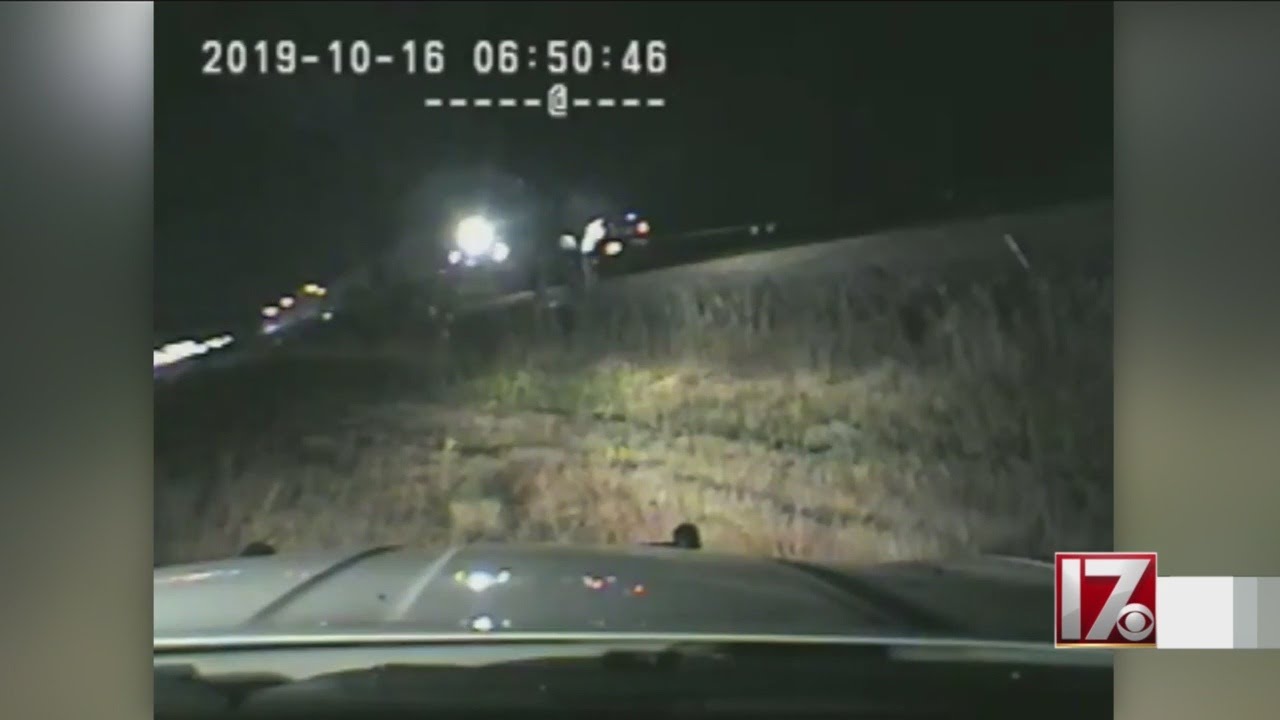 VIDEO: Trooper pulls man from crashed car just seconds before train hits