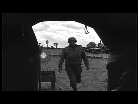 Allied Red Ball Express truck convoy on the  move in Saint-Lo, France. HD Stock Footage
