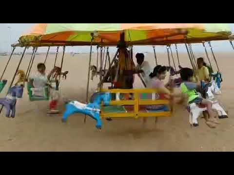 Arima - Merry go round in Marina beach
