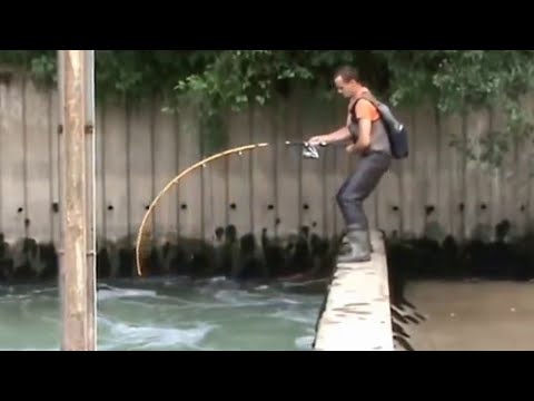 Crazy Man fight big Catfish over a dam by Catfish World