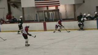 Bantam Hockey player steps aside and makes his attacker look silly!