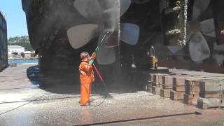 SLT8-3200 Cleaning Barnacles Off Tug Boat