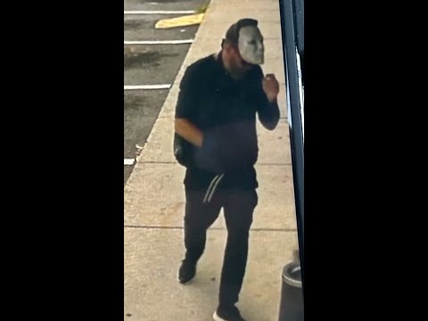Florida police seek armed suspect in Michael Myers mask