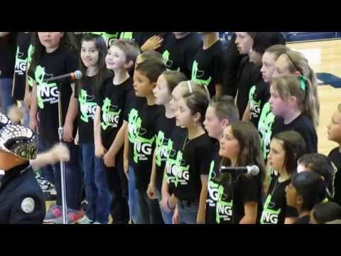 Christie Elementary singing at Legends Game