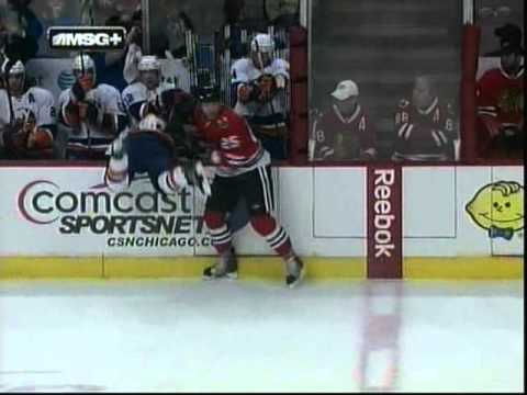 Viktor Stalberg hits Andrew MacDonald into the bench