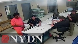 Sandra Bland intake video shows mugshot and phone call