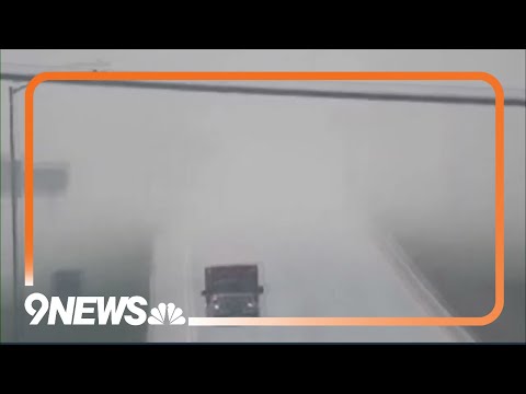 Single car drives out of zero-visibility dust storm in eastern Colorado