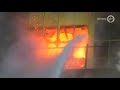 Zeer grote brand in fabriekspand Eerbeek, vlammen slaan uit gebouw