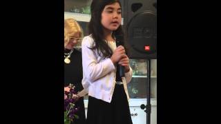 Kira (age 7) leads "I'll Fly Away" for her great-grandmother's memorial service.