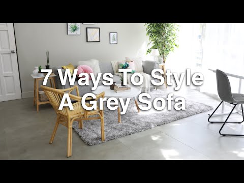 Part of a video titled 7 Ways To Style A Grey Sofa | MF Home TV - YouTube