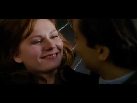 Spider-Man 3 trailer frame showing Peter Parker and Mary Jane facing each other in the rain