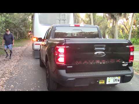 Ford Maverick Towed behind a Sprinter Leisure Travel Van