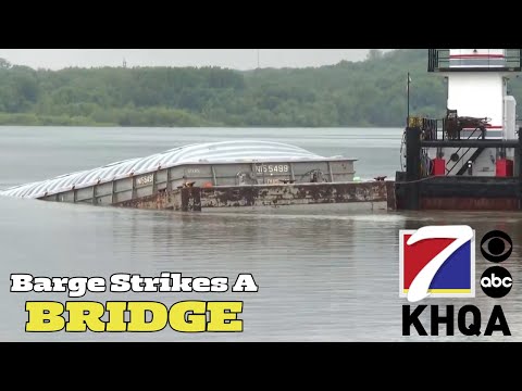 A Barge Sunk After It Struck a Bridge While Traveling Through Fort Madison in Iowa