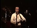 David Byrne throwing condoms at audience (1992)
