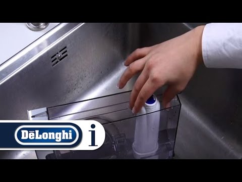 Part of a video titled How to Clean the Water Tank of Your De'Longhi Magnifica S ... - YouTube