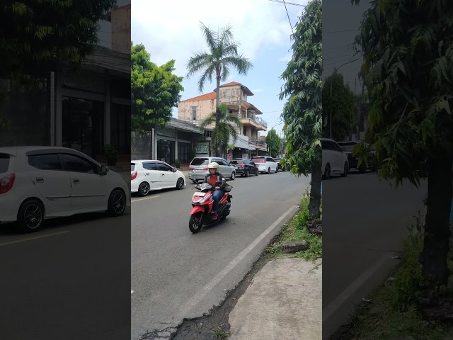 Red Truck Loaded with Wood as Raw Material for Furniture in Jepara