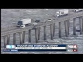 High winds blows truck off bridge