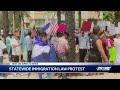 Demonstrators In Downtown West Palm Beach Rally Against New Florida Immigration Law