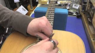 How to adjust the truss rod/string buzz on an acoustic guitar by KSM Music