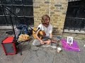 A brief encounter with singer songwriter Sam Garrett + he sings some of his songs in Camden Market.