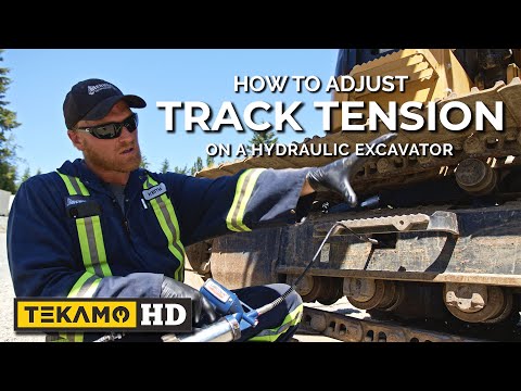 Part of a video titled He Adjusts Hydraulic Excavator Tracks IN MINUTES - YouTube