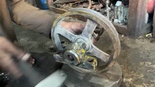 Bearing shaft is out of size Mechanics are repairing it.