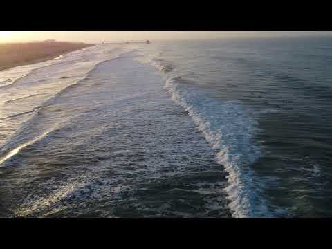 Surfer gets nice left - Huntington Beach - California - February 17th, 2021 - 7:12am PST