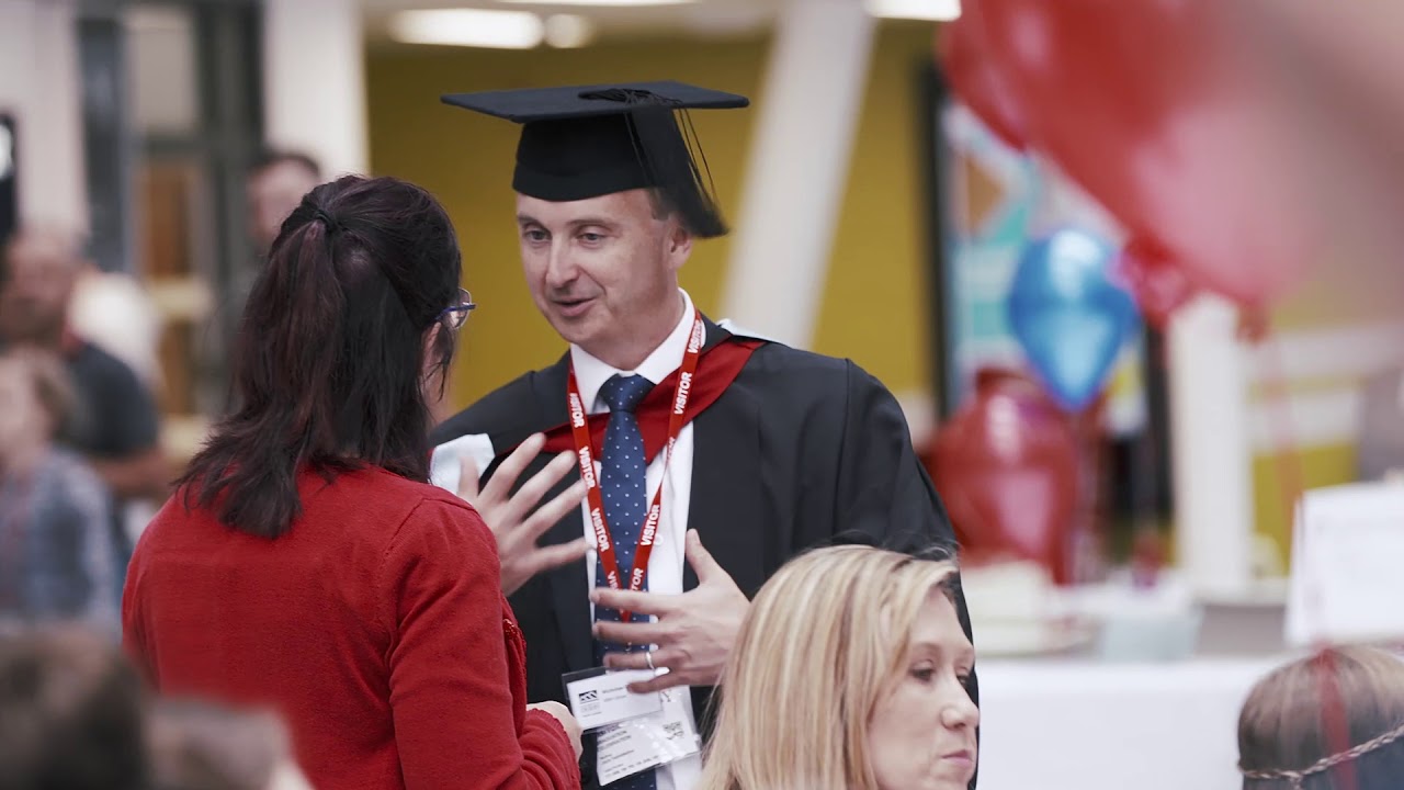 Nicolas Goddard talking about the online MBA Global at the July 2019 graduation reception