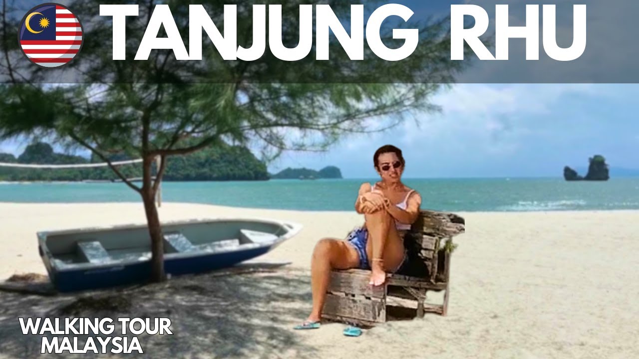 Embark on an enchanting walking tour of the serene Tanjung Rhu Beach.