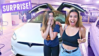 SURPRISING MY BEST FRIEND (Roommate) WITH A TESLA! She screamed