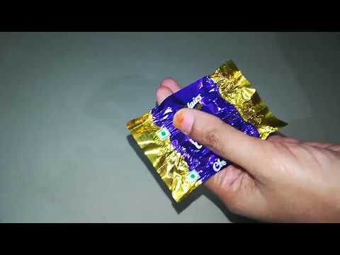 Chocolate wrapper doll making / by Gouthami