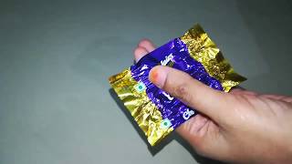 Chocolate wrapper doll making / by Gouthami