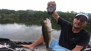 CATCHING HUGE BASS IN THUNDER STORM !! * GETS EXTREME *