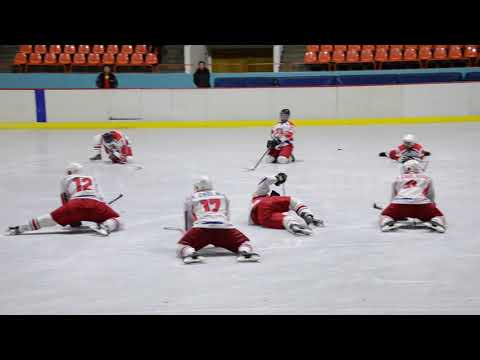 North Korean national hockey team stretch before game in Pyongyang