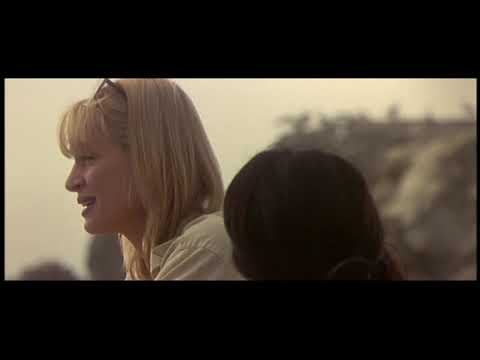 Trailer panel of split-screen calls and city strolls — the spaces where songs like 'Caramel' and 'Run-Around' live