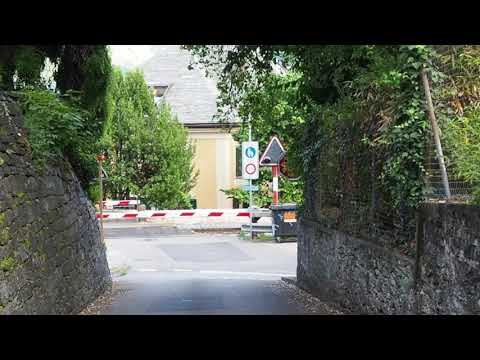 TILO train at railroad crossing in Minusio (CH)