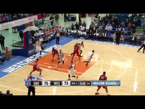 Jordan Bachynski stuffs the dunk attempt for the Knicks