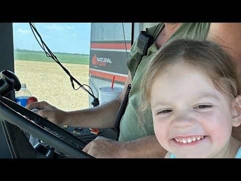 8 year old running combine solo.  grandkids riding.