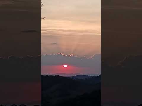 lindo por do sol, no morro do buraco paiol, Rio espera MG.